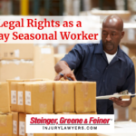 man working with boxes legal rights as a holiday seasonal worker