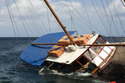 boating accident, half sunk ship