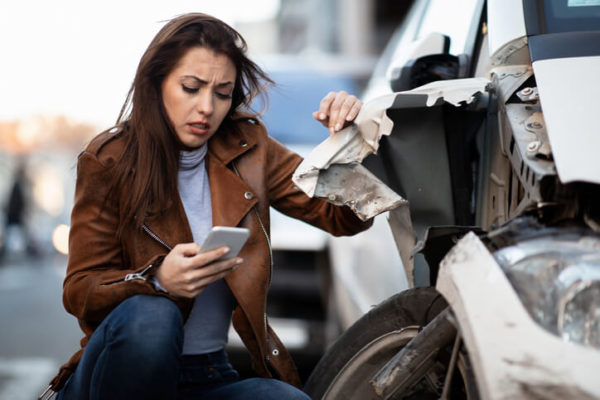 woman contacting a car accident attorney