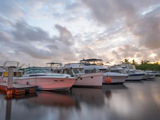 boats in a dania beach marina - car accident lawyer