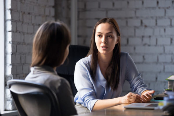 woman negotiating with the insurance company after a car accident