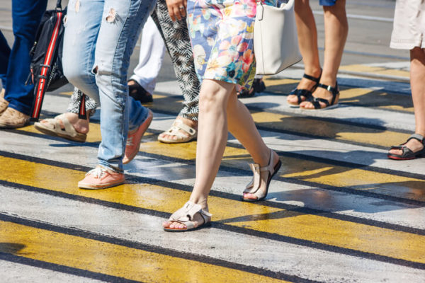 pedestrians walking across road in florida