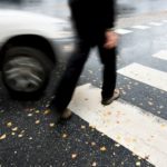 Pedestrian about to collide with a car