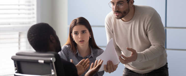 smaller version of couple arguing with lawyer