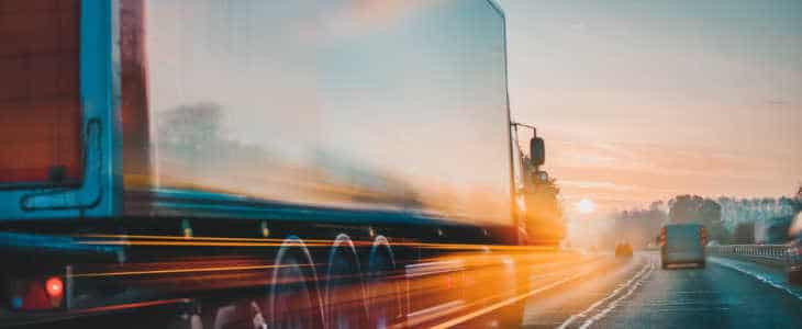 truck driving fast on the highway