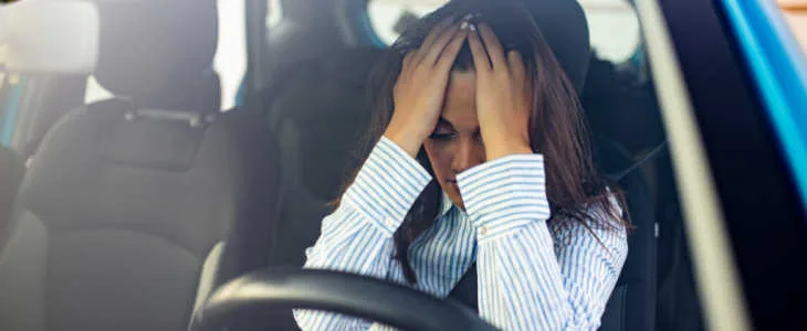 Stressed woman drive car feeling sad and angry. Girl tired, fatigue mental on car. Sleepy and drunk female hangover. Illegal law driver license. Driving when tired and do not drive drowsy concept