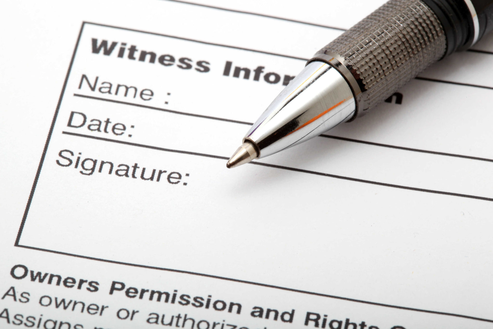 witness for car accident report - release contract detail with ballpen