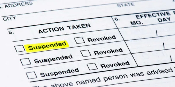 A form from the DMV suspending a driver's license.