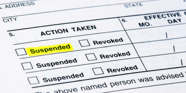 A form from the DMV suspending a driver's license.