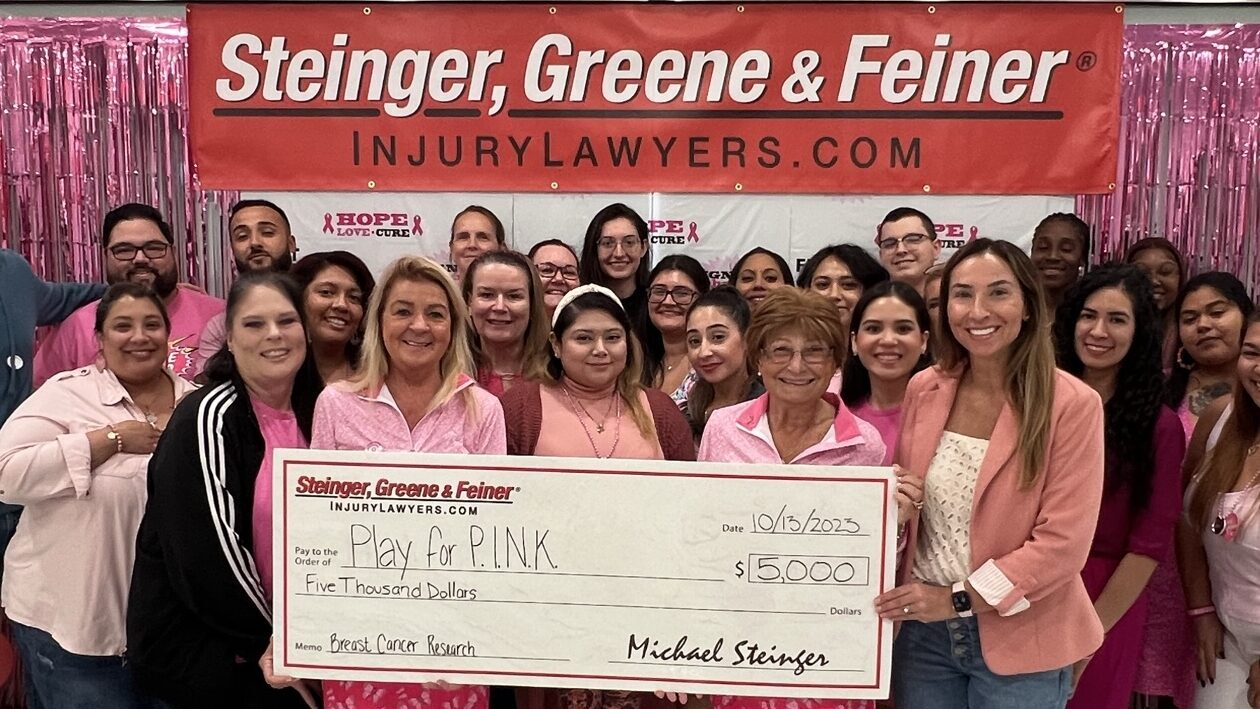 Steinger, Greene and Feiner Donate $5,000 check to Play for P.I.N.K. and Breast Cancer Research